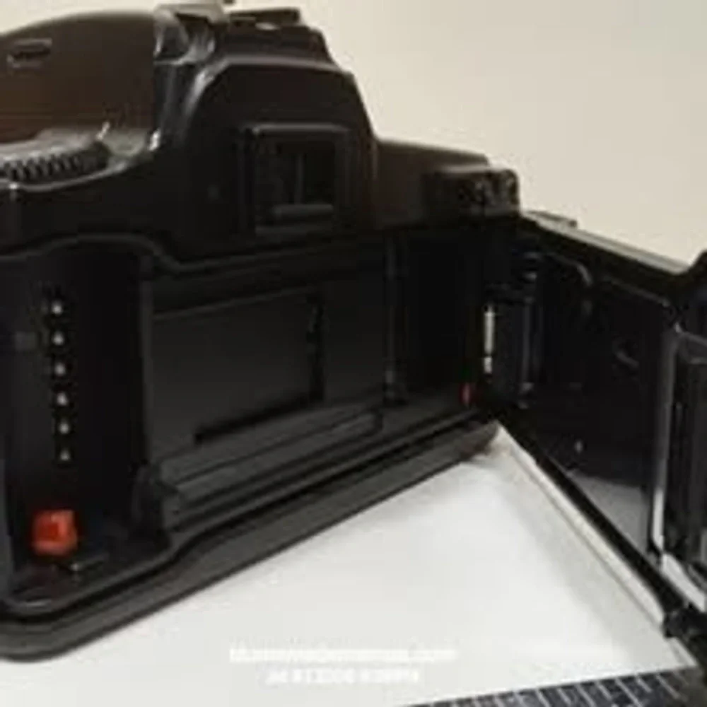 Canon EOS 1000F N 35mm SLR film camera body in black.